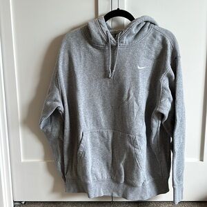 Light gray Nike sweatshirt.